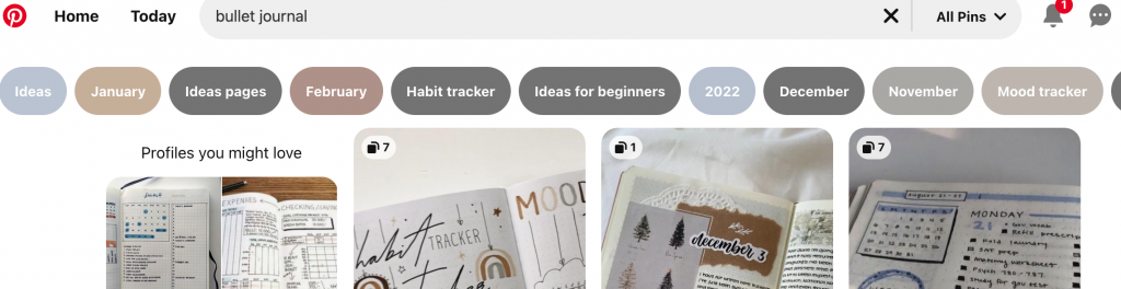 Pinterest search for bullet journal. Colorful bubbles with long-tailed keywords under the search bar.