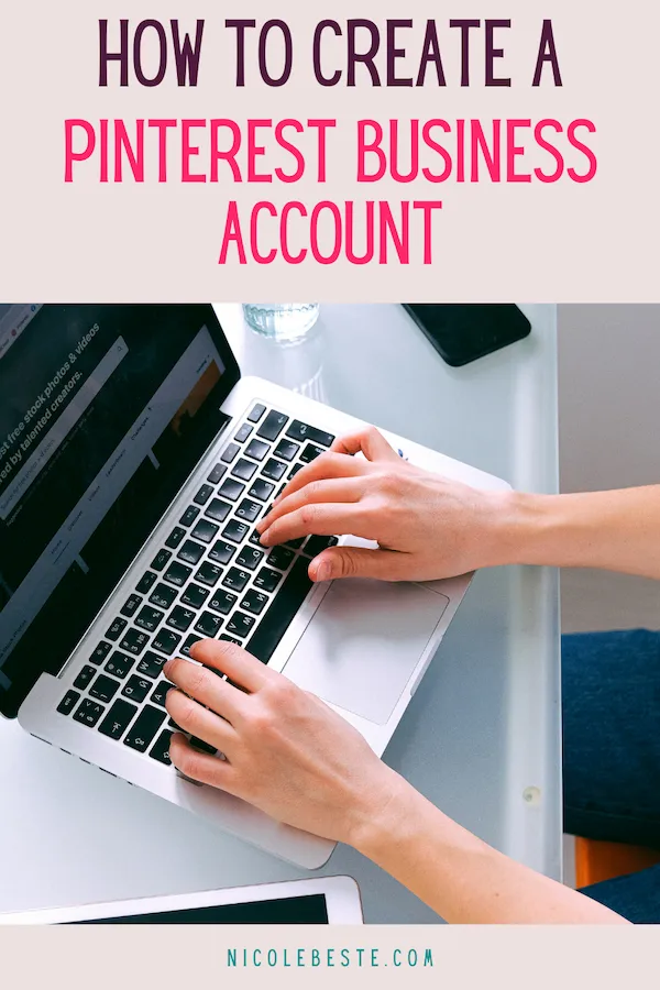 Hands typing on laptop with text: How to create a Pinterest Business Account